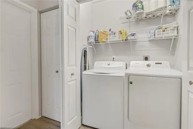 a utility room with dryer and washer