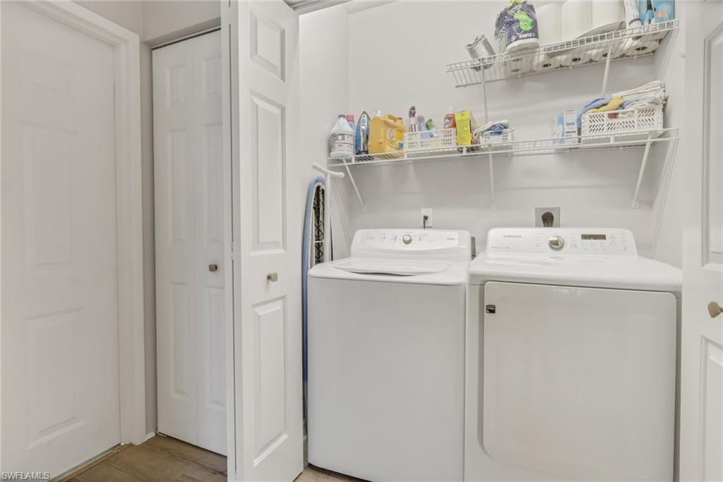 4536 Court Way, Unit 19D Naples, FL 34109 - Photo 24 of 27 a utility room with dryer and washer
