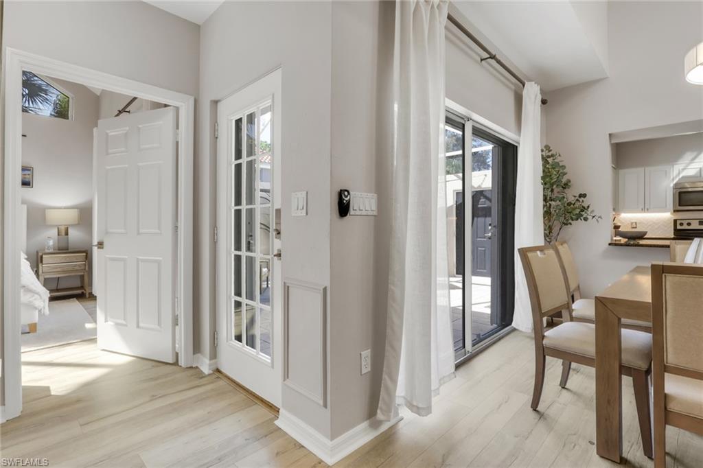 4536 Court Way, Unit 19D Naples, FL 34109 - Photo 4 of 27 a view of a livingroom with furniture and entryway livingroom