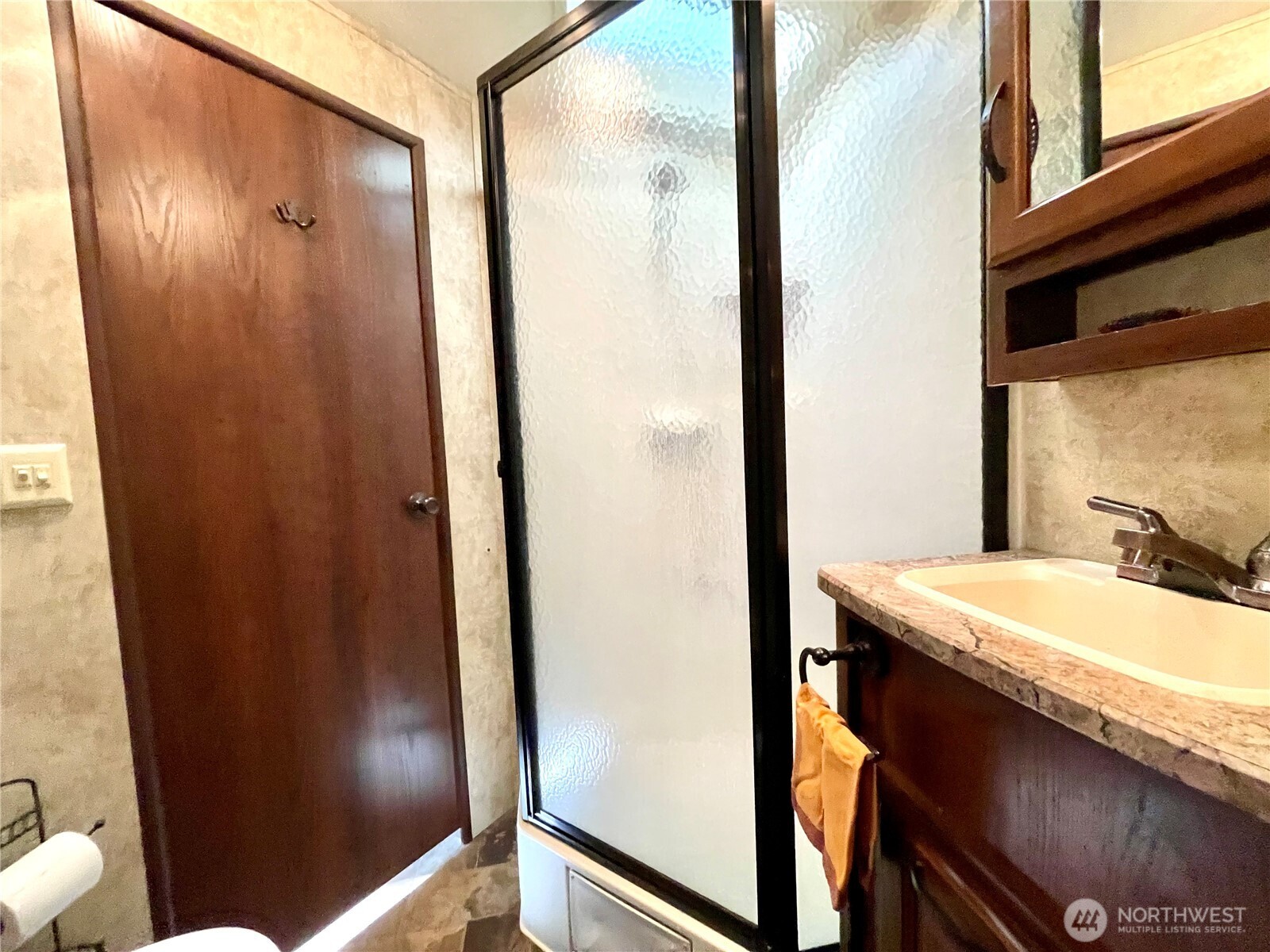 56 Butterfly Lane Pacific Beach, WA 98571 - Photo 26 of 29 a bathroom with a sink and a mirror