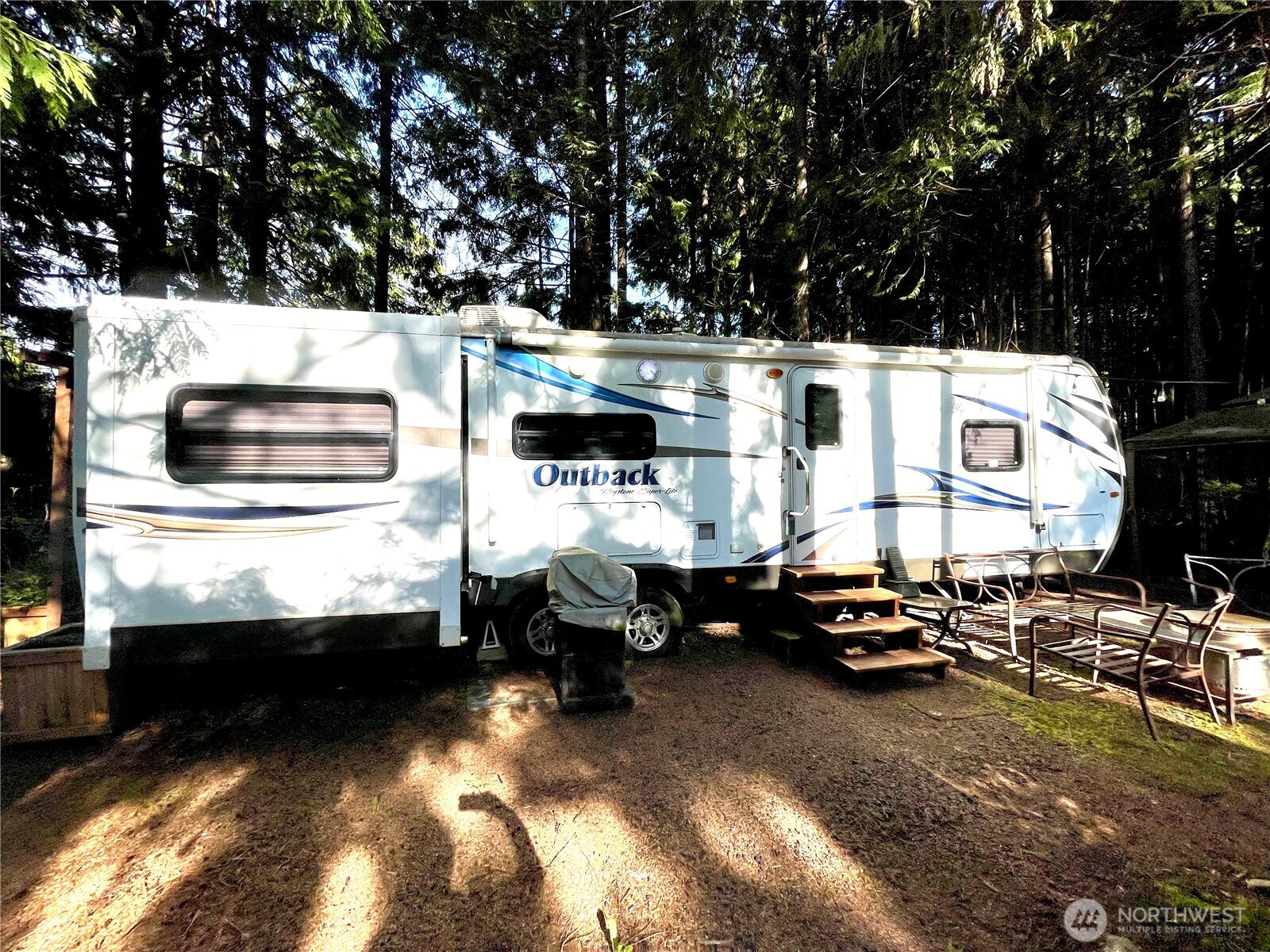56 Butterfly Lane Pacific Beach, WA 98571 - Photo 29 of 29 a cars parked in front of a house