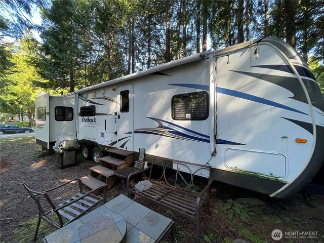 a view of a back yard of the house