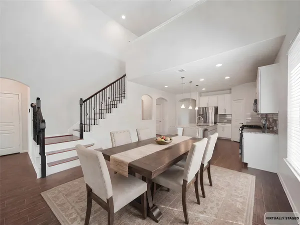 a view of a dining room with furniture
