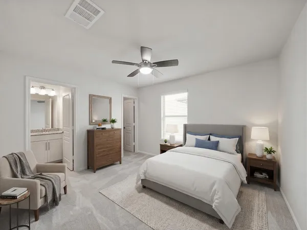 a bedroom with a large bed and furniture