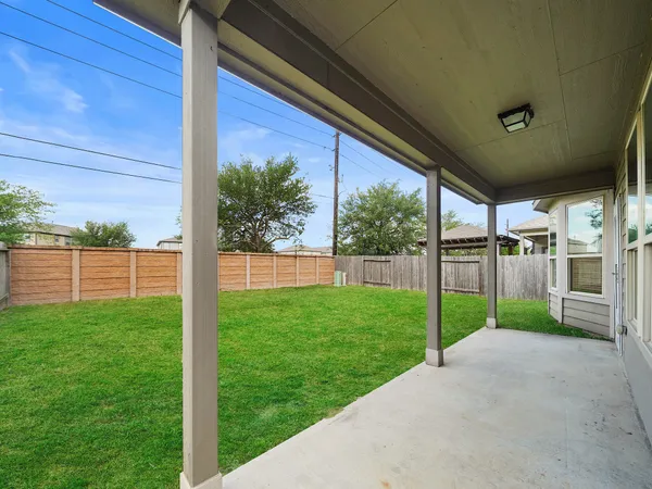 a view of a porch with a yard