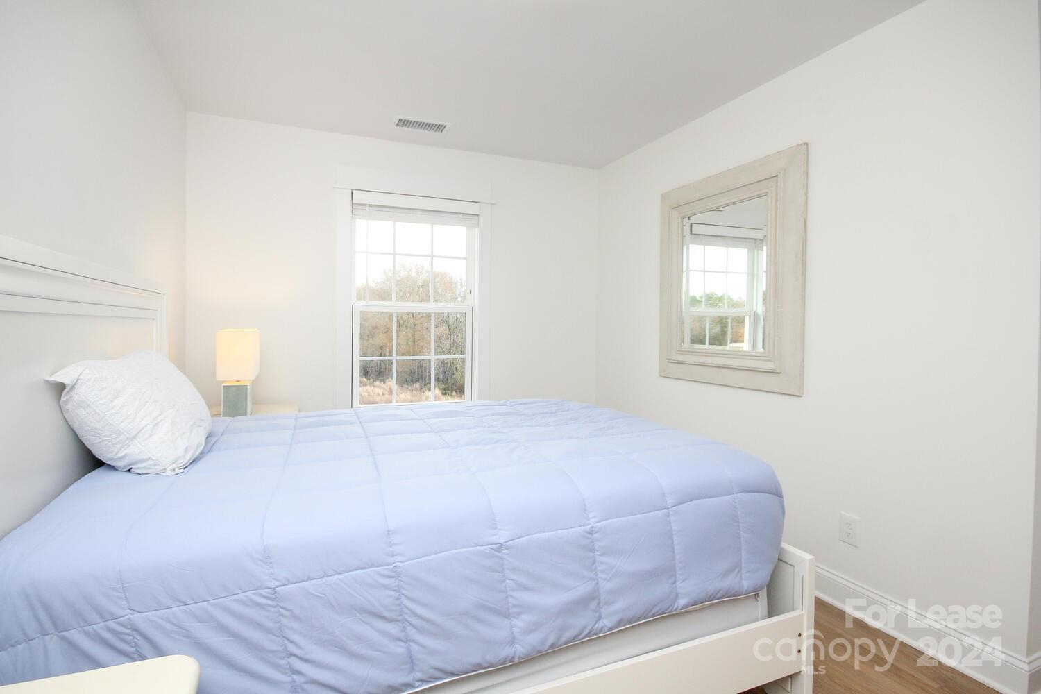 1088 Startown Road Lincolnton, NC 28092 - Photo 38 of 48 a bedroom with a bed and window