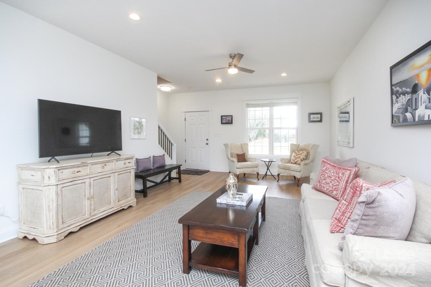 1088 Startown Road Lincolnton, NC 28092 - Photo 9 of 48 a living room with furniture and a flat screen tv