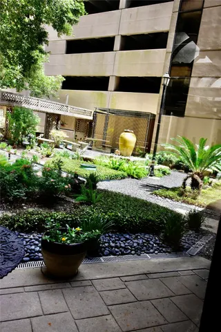 an aerial view of a house with a swimming pool