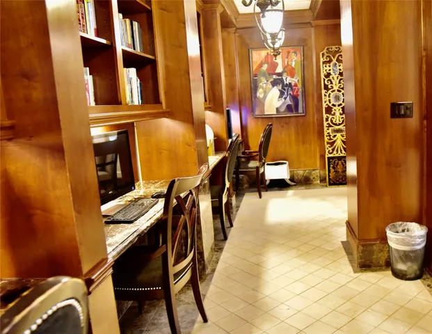 a view of interior space with porch and wooden floor