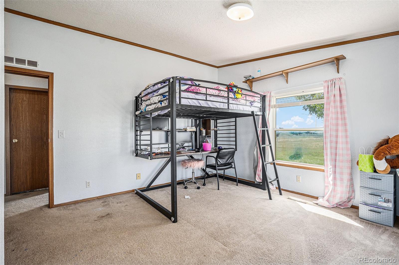 8260 County Road 39 Fort Lupton, CO 80621 - Photo 20 of 32 a view of a room with gym equipment