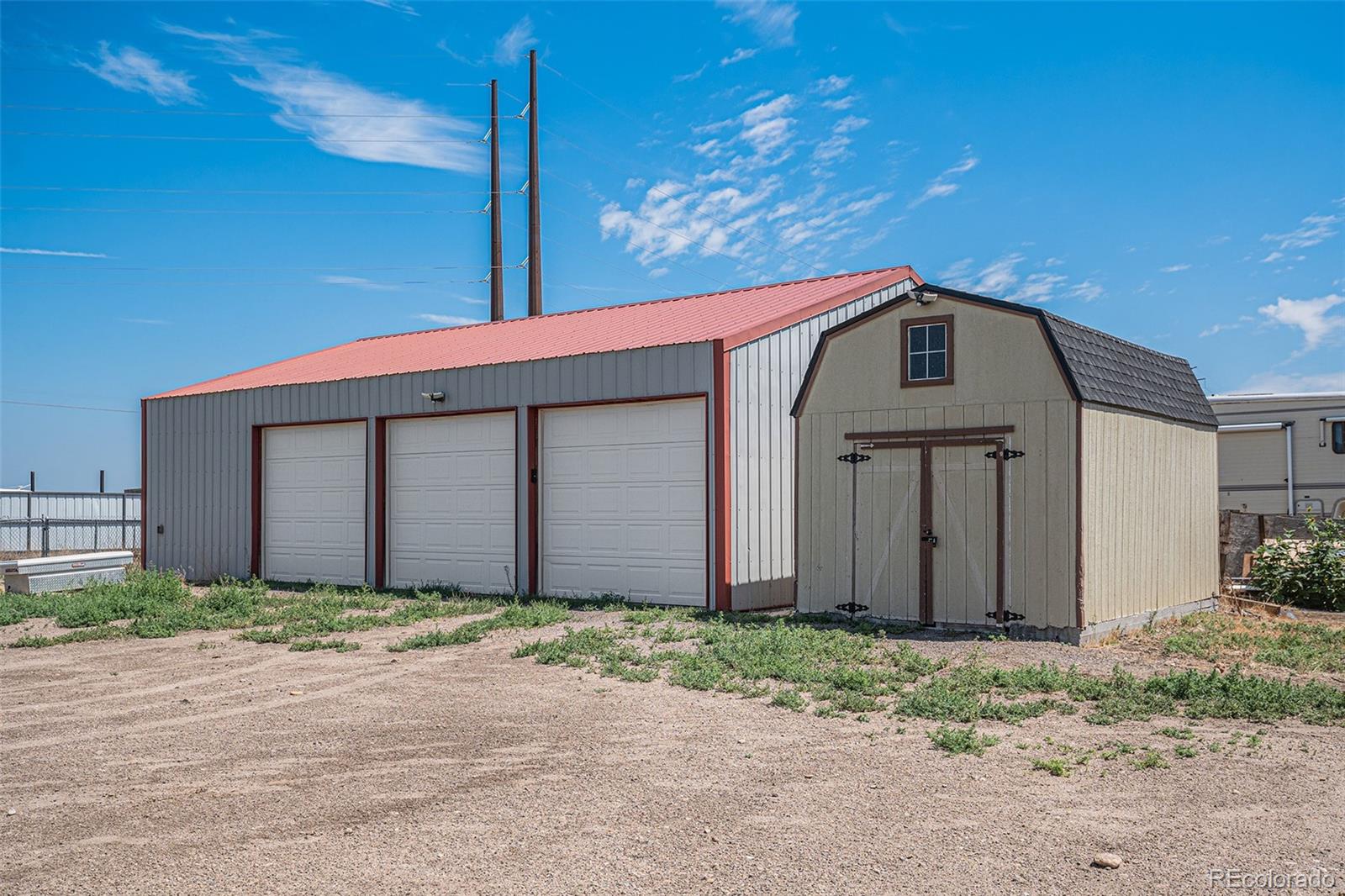 8260 County Road 39 Fort Lupton, CO 80621 - Photo 26 of 32 a front view of a house with a yard