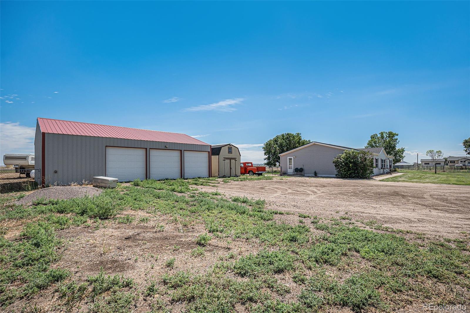 8260 County Road 39 Fort Lupton, CO 80621 - Photo 27 of 32 a house view with a backyard space