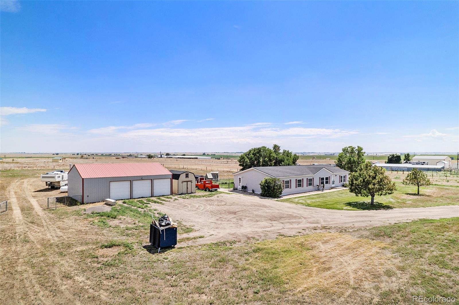 8260 County Road 39 Fort Lupton, CO 80621 - Photo 28 of 32 a view of a terrace with lawn chairs