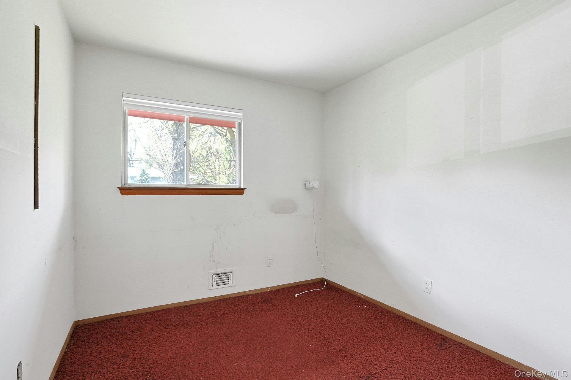 44 Southgate Drive Spring Valley, NY 10977 - Photo 12 of 24 a view of an empty room with a window