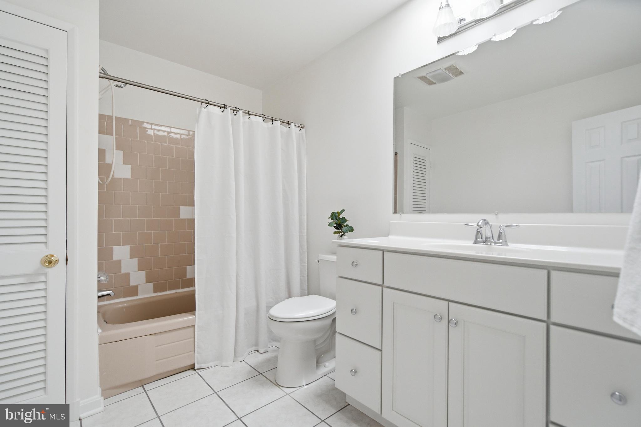 220 Solway Road Lutherville-Timonium, MD 21093 - Photo 18 of 38 a bathroom with a sink a toilet and shower