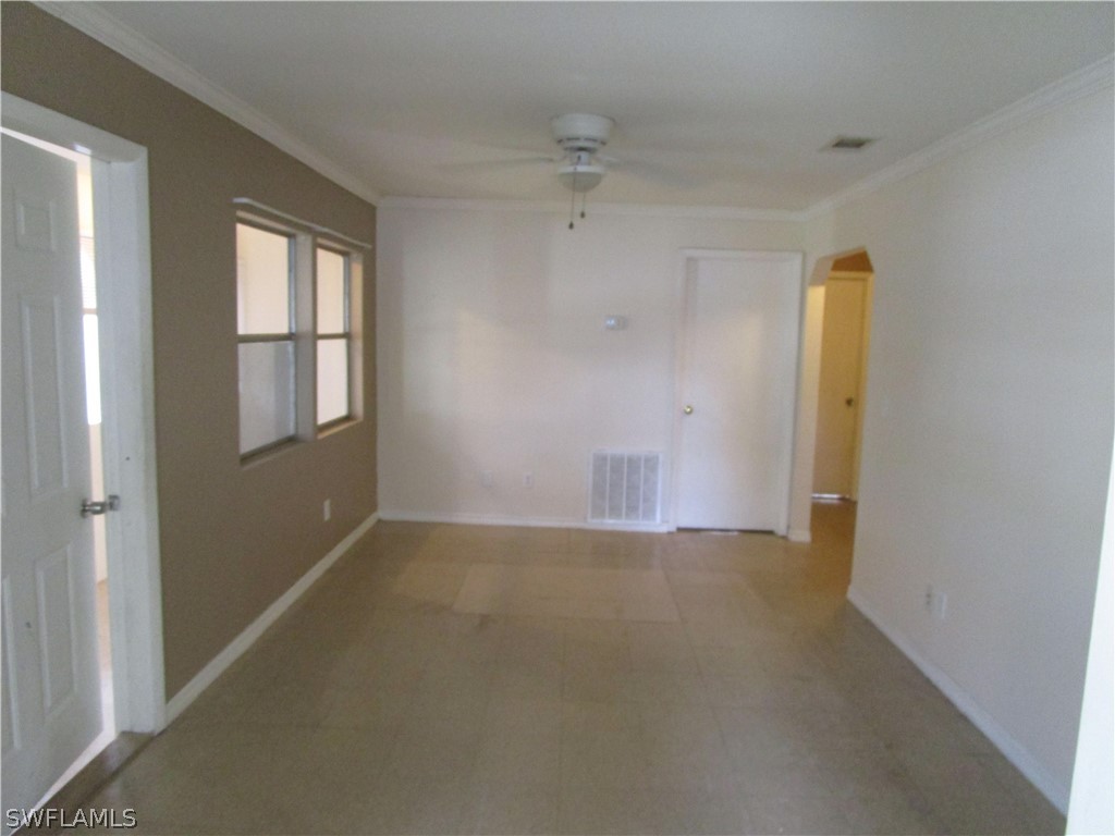 15790 Pine Ridge Road Fort Myers, FL 33908 - Photo 11 of 17 an empty room with windows and closet