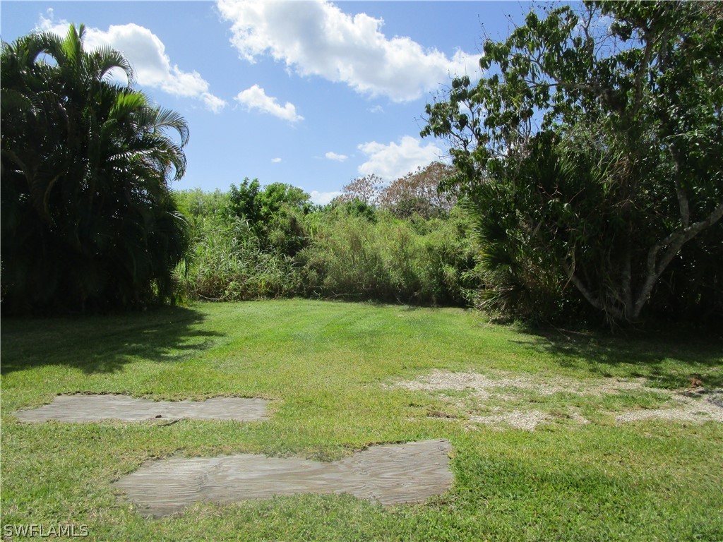 15790 Pine Ridge Road Fort Myers, FL 33908 - Photo 6 of 17 a view of a yard