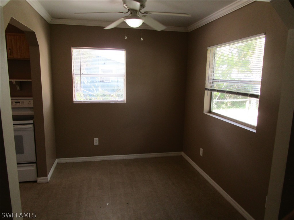 15790 Pine Ridge Road Fort Myers, FL 33908 - Photo 10 of 17 a view of an empty room with a window