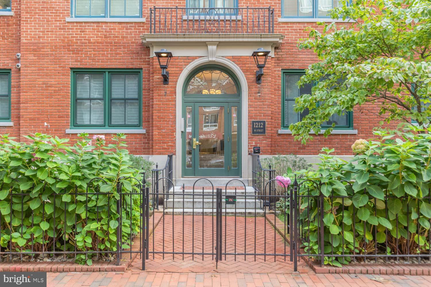1212 M Street Northwest, Unit 401 Washington, DC 20005 - Photo 16 of 16 a front view of a house