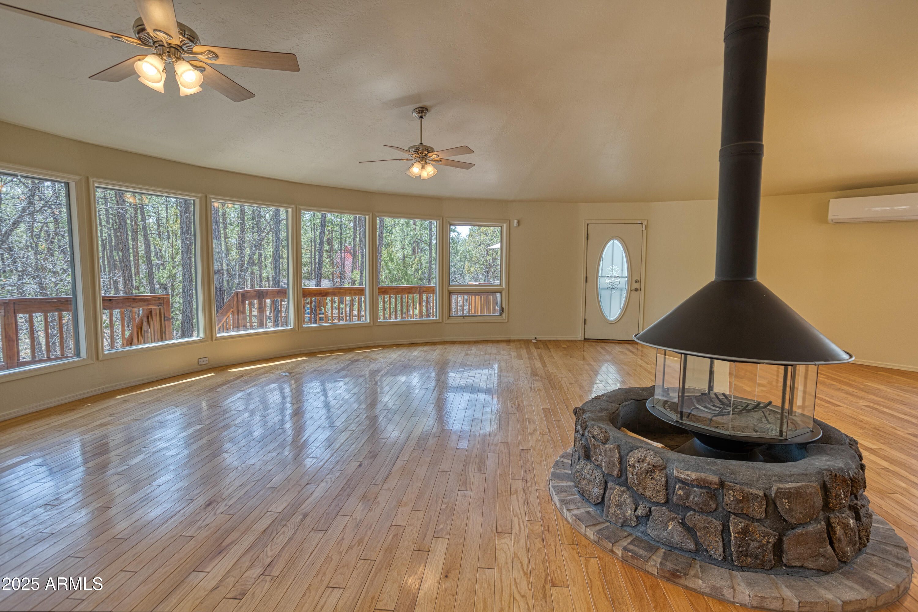 902 Rim Road Lakeside, AZ 85929 - Photo 30 of 55 Unique round fireplace