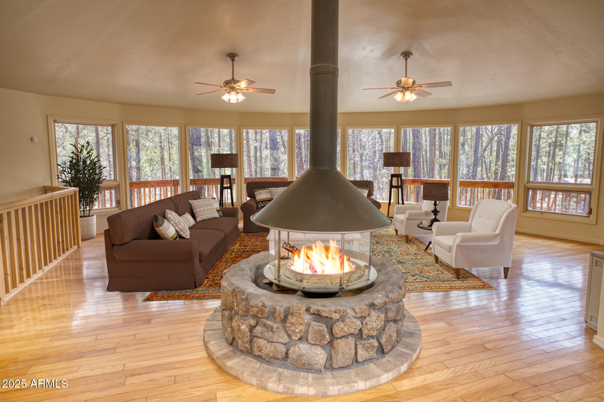 902 Rim Road Lakeside, AZ 85929 - Photo 3 of 55 Staged Great Room with Circular Fireplac