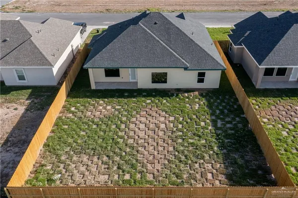 a house with green field