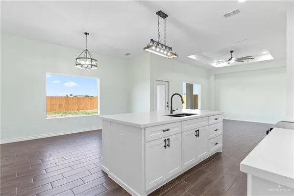 a view of a bathroom sink and a mirror