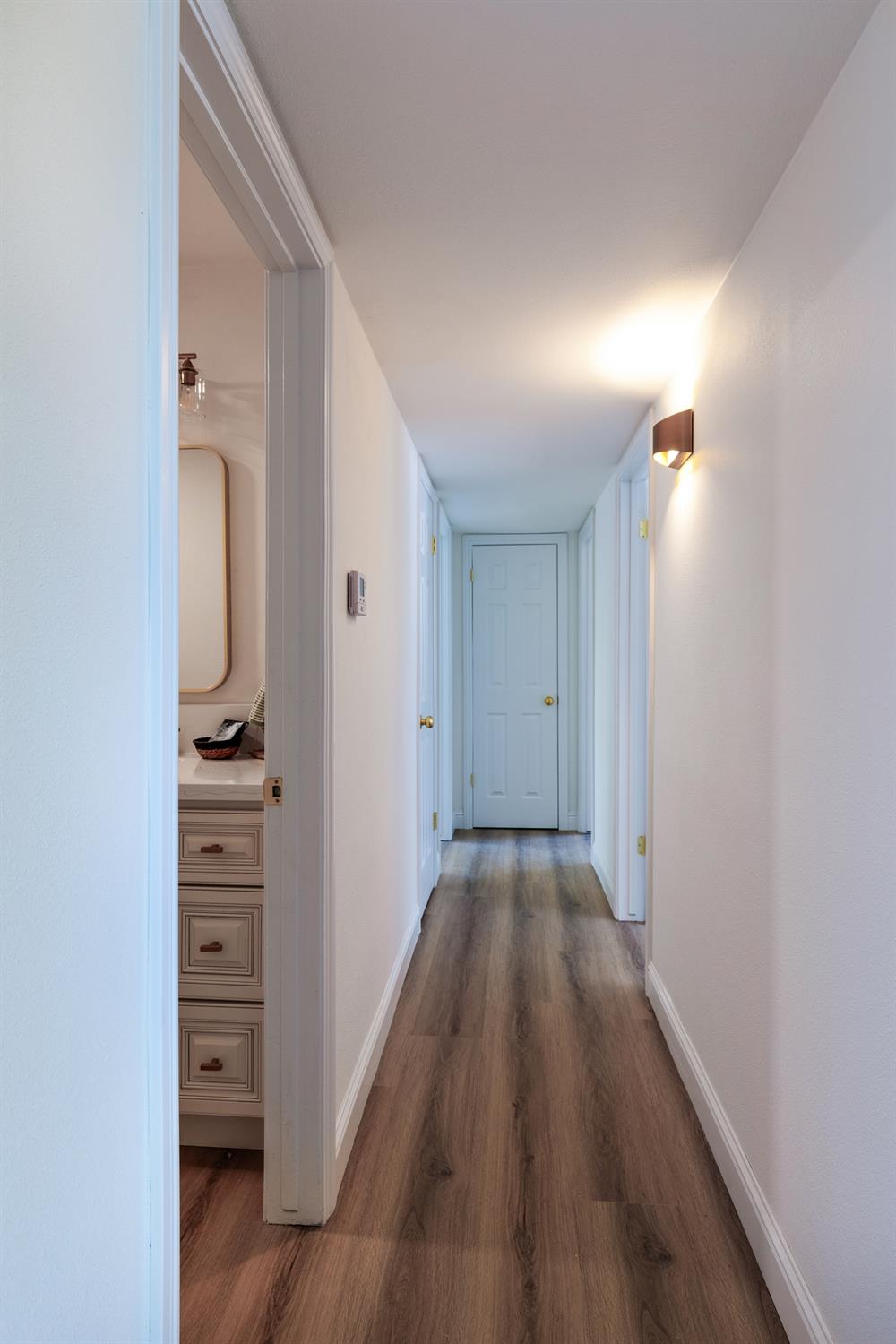 1185 East Evening Glow Circle Reedley, CA 93654 - Photo 21 of 42 wooden floor in a hall with an entryway