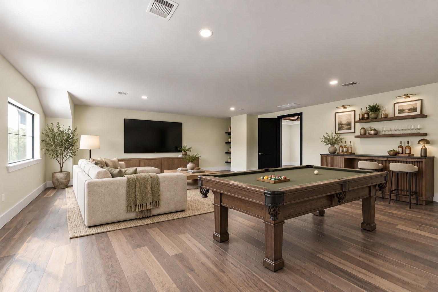 23701 Birch Grove Road Montgomery, TX 77316 - Photo 42 of 50 Discover the ultimate flex room, beautifully staged with a luxurious pool table, cozy seating area, and a stylish bar, perfect for entertaining or relaxing.