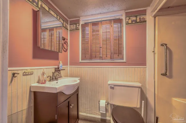 a front view of the house with a yard