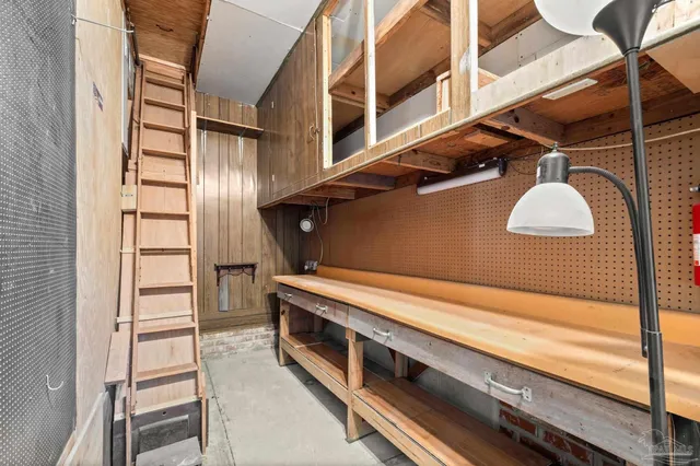 a front view of house with yard and garage