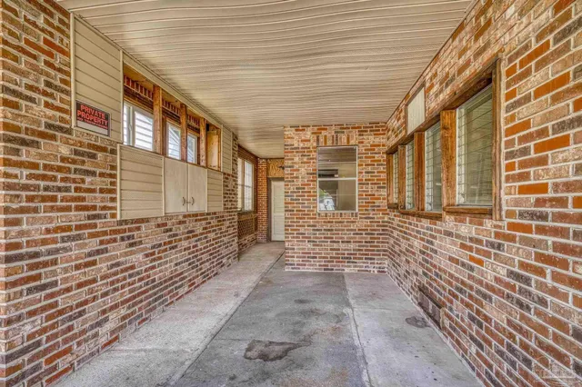 a view of a house with a yard and garage