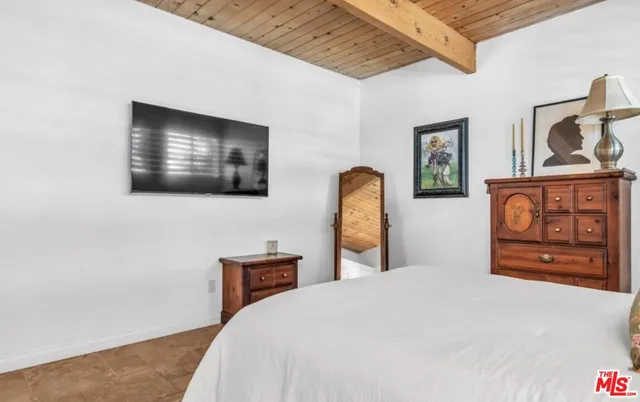 a view of a patio with a table chairs and a patio