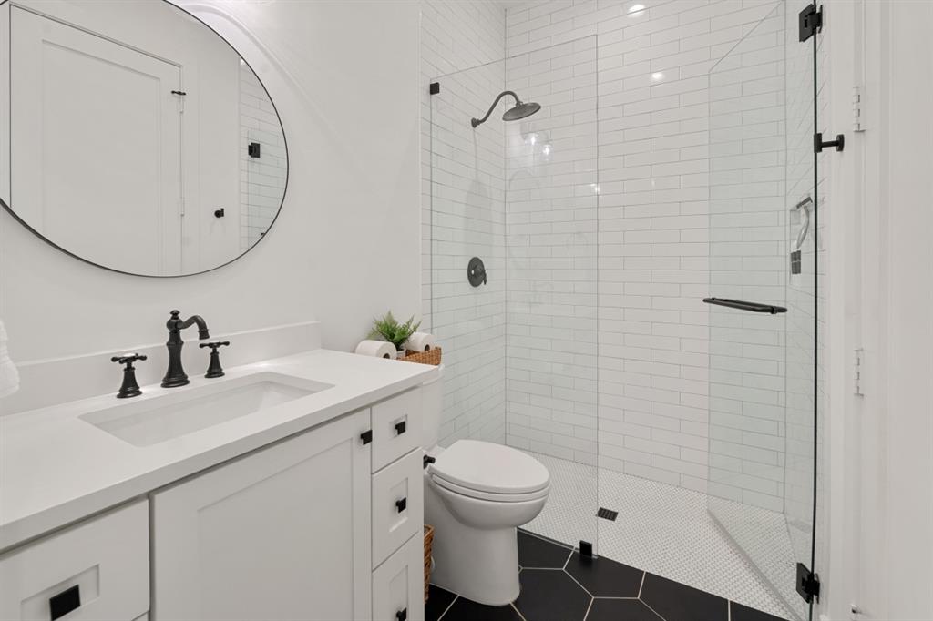 2545 Homestead Court Tool, TX 75143 - Photo 22 of 39 a bathroom with a sink a toilet and shower