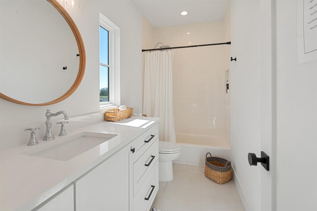 2545 Homestead Court Tool, TX 75143 - Photo 25 of 39 a bathroom with a sink and a mirror