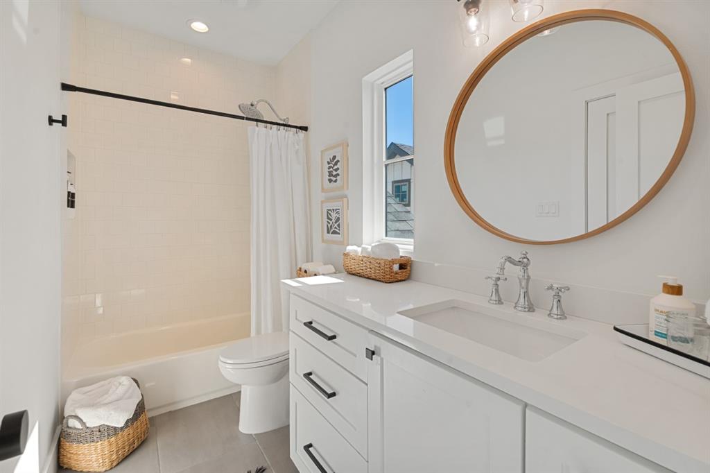 2545 Homestead Court Tool, TX 75143 - Photo 27 of 39 a bathroom with a granite countertop sink toilet and a mirror