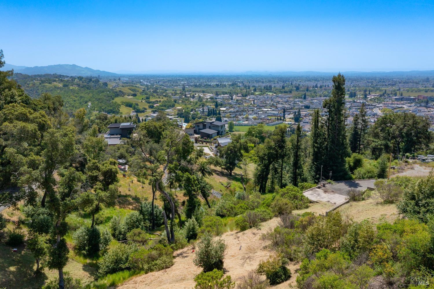 1058 Wikiup Drive Santa Rosa, CA 95403 - Photo 21 of 25 a view of a city with lush green forest