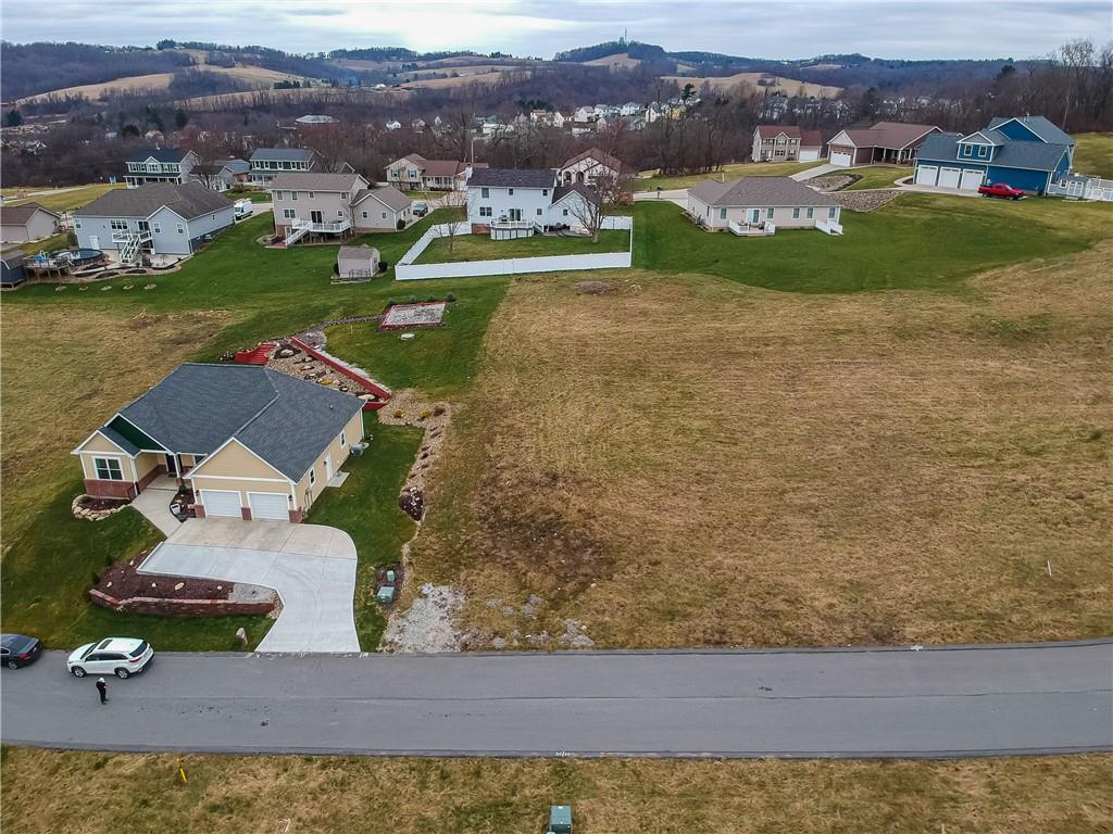 an aerial view of a house with a garden