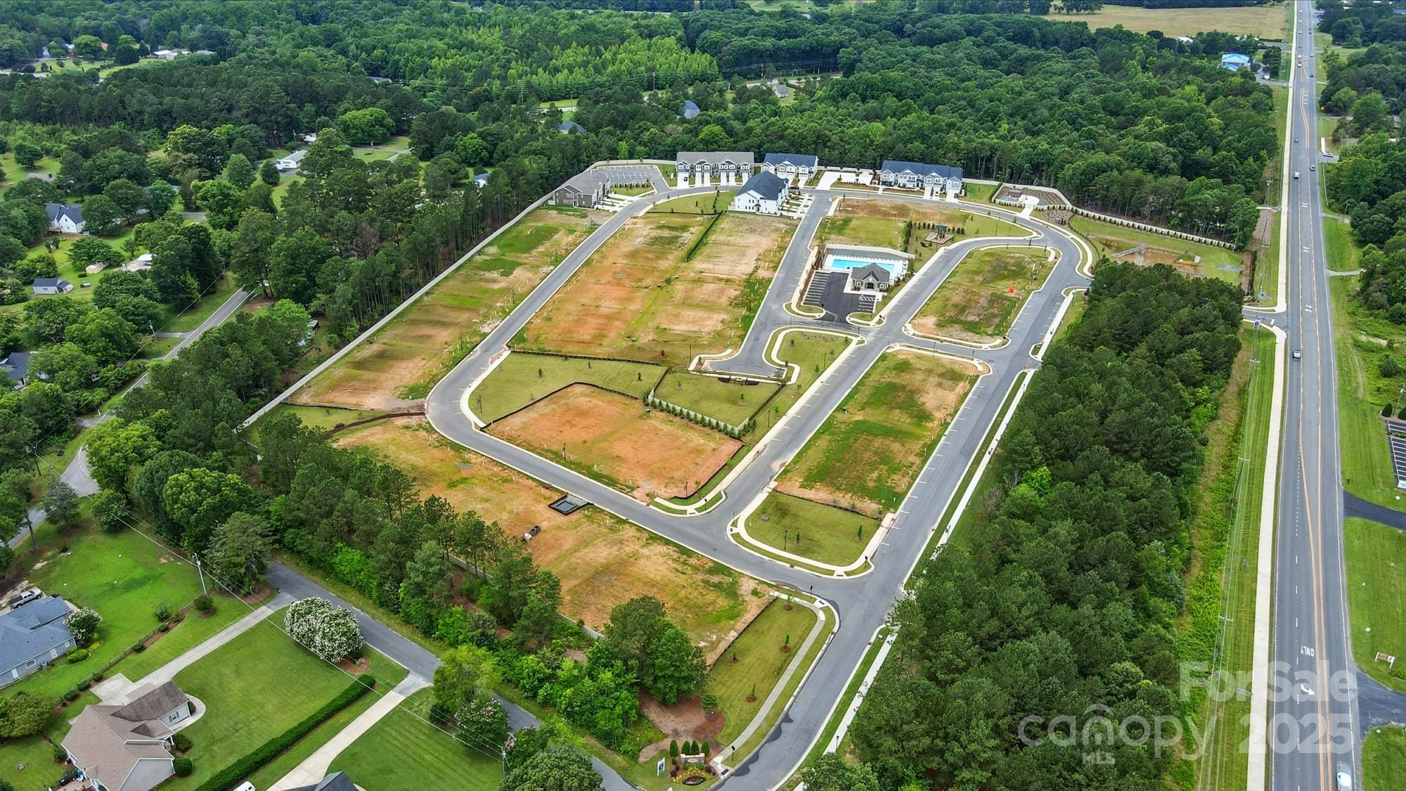 645 Cassidy Court Clover, SC 29710 - Photo 31 of 31 an aerial view of a house with a swimming pool