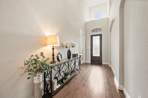 a view of a hallway view with staircase