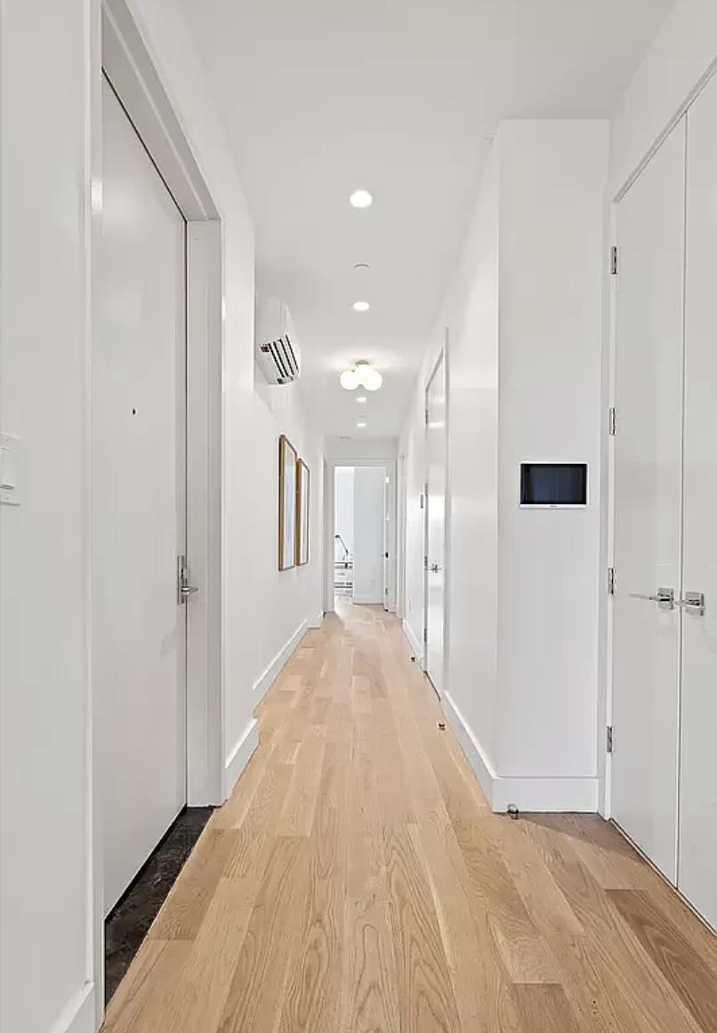1105 Cortelyou Road, Unit PHA Brooklyn, NY 11218 - Photo 13 of 16 a view of a big room with closet and windows