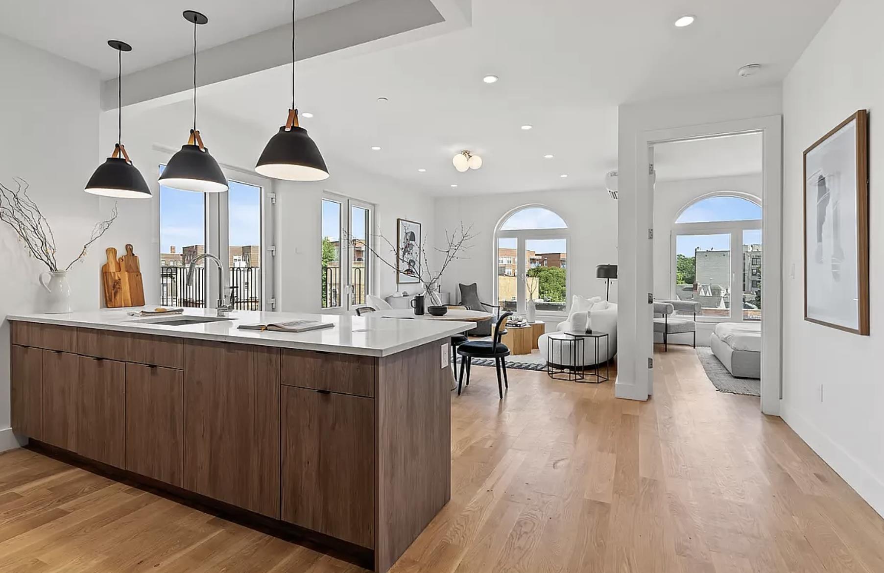1105 Cortelyou Road, Unit PHA Brooklyn, NY 11218 - Photo 3 of 16 a open kitchen with sink a counter top space and living room view
