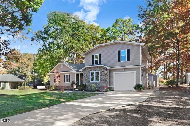 front view of a house with a yard