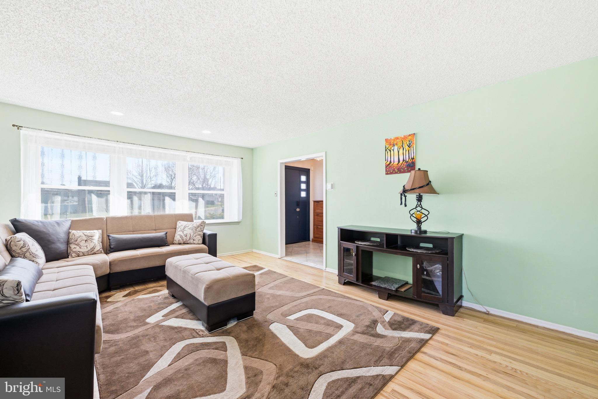 1087 Roberts Road Warminster, PA 18974 - Photo 15 of 36 Bright living room off the front entrance...