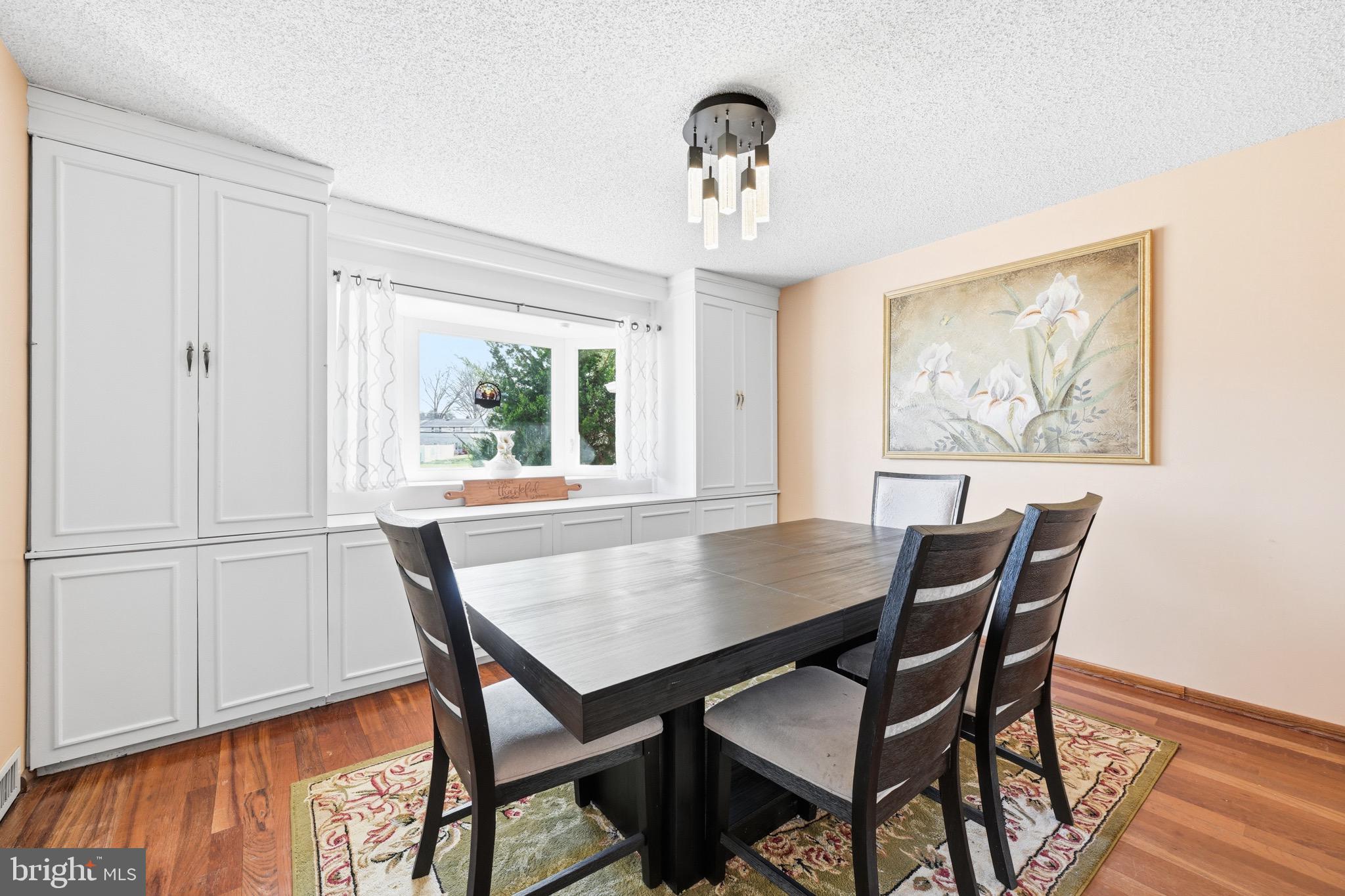 1087 Roberts Road Warminster, PA 18974 - Photo 5 of 36 Lovely built-in storage highlighting bay window.