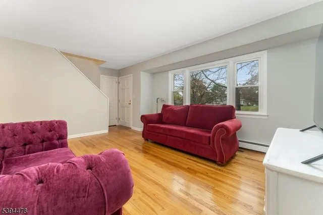 a living room with furniture and a couch