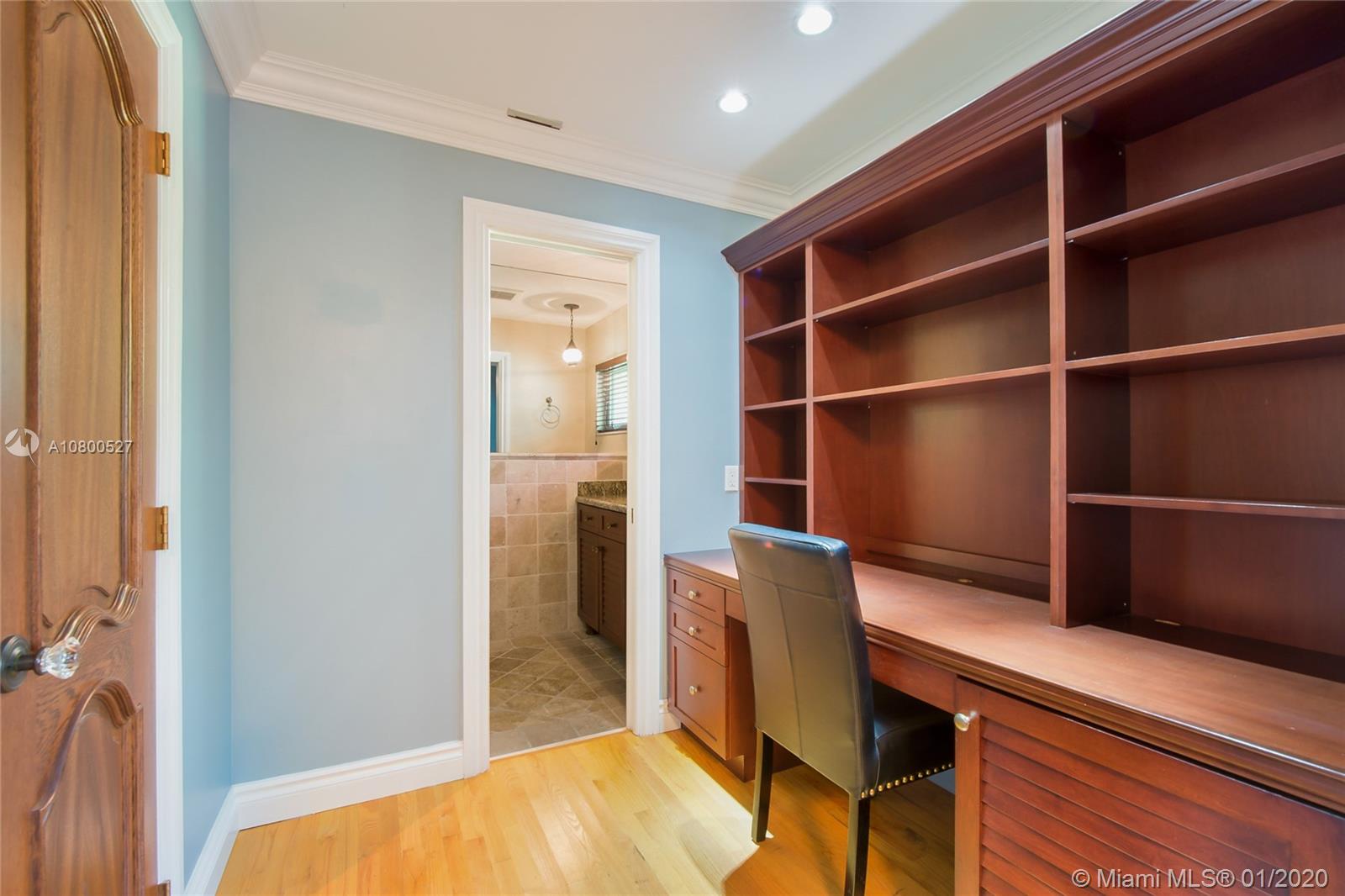 12440 Moss Ranch Road Pinecrest, FL 33156 - Photo 12 of 33 a view of a workspace with furniture