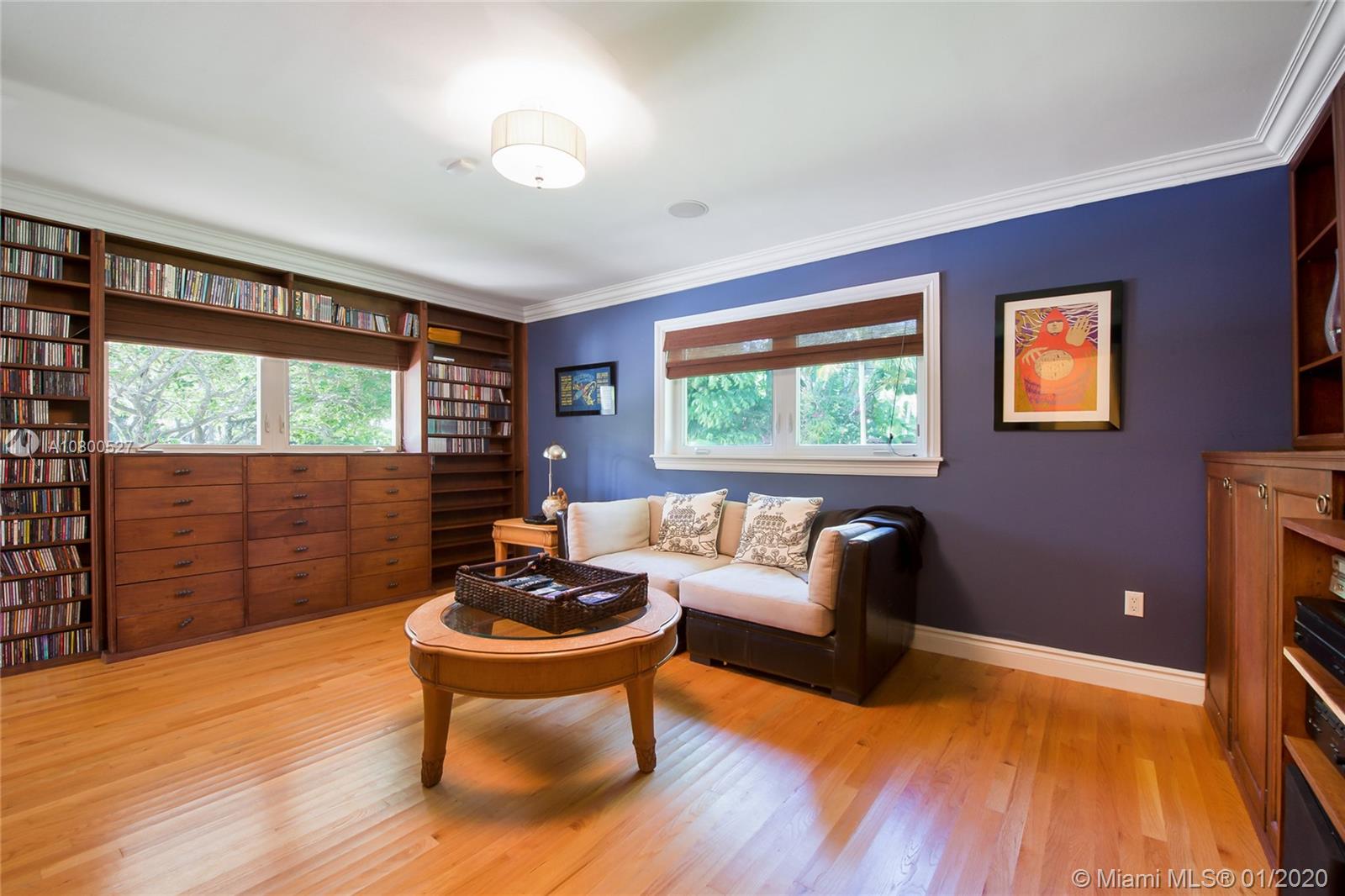 12440 Moss Ranch Road Pinecrest, FL 33156 - Photo 14 of 33 a living room with furniture and a window