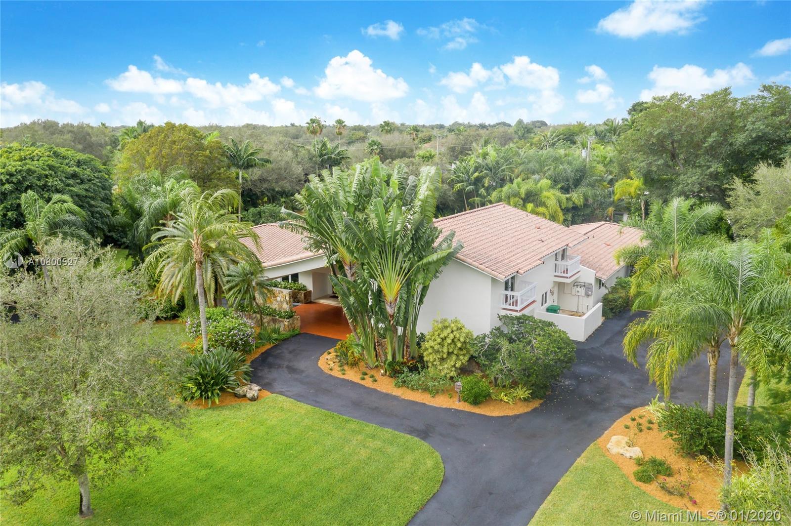 12440 Moss Ranch Road Pinecrest, FL 33156 - Photo 2 of 33 an aerial view of a house