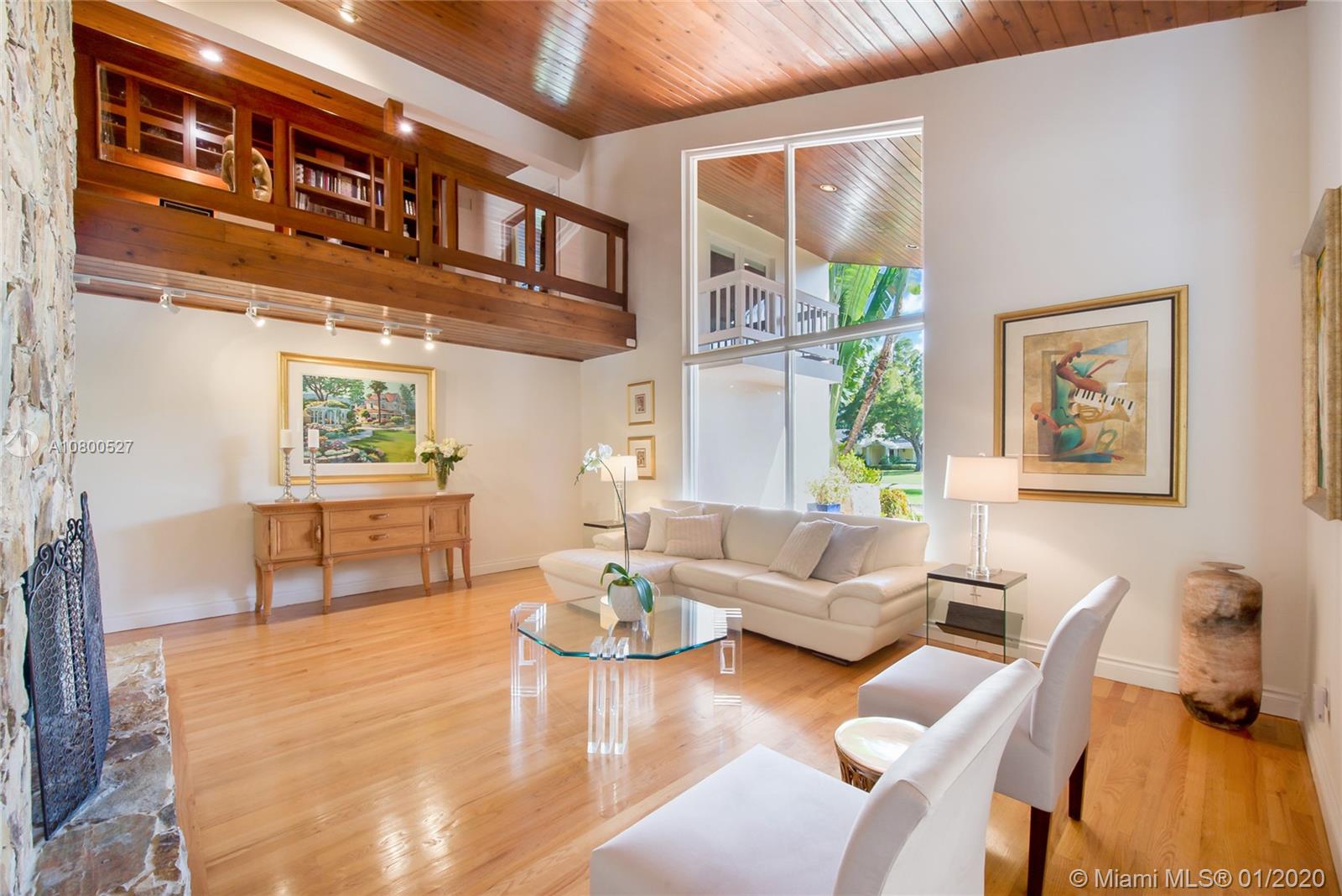 12440 Moss Ranch Road Pinecrest, FL 33156 - Photo 4 of 33 a living room with furniture